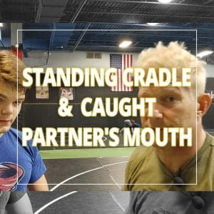 Phil hit the standing cradle and caught his partner's mouth...OOPS!!